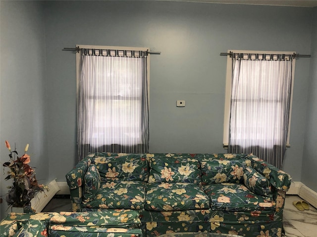 19 Wawayanda Ave, Middletown, NY 10940 - living area with a baseboard heating unit and marble finish flooring