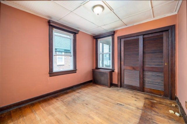2430 Loft Ave, Baldwin, NY 11510 - unfurnished room featuring crown molding and hardwood / wood-style flooring