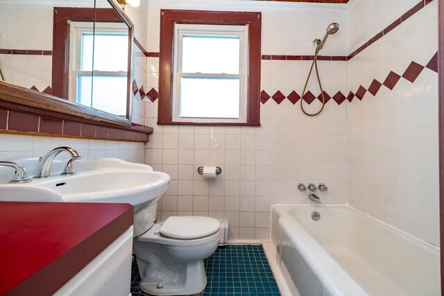 2430 Loft Ave, Baldwin, NY 11510 - bathroom with tile walls, vanity, and tile patterned flooring