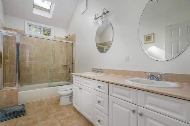 2 Undset Ct, Dix Hills, NY 11746 - full bath with double vanity, a skylight, enclosed tub / shower combo, tile patterned flooring, and lofted ceiling