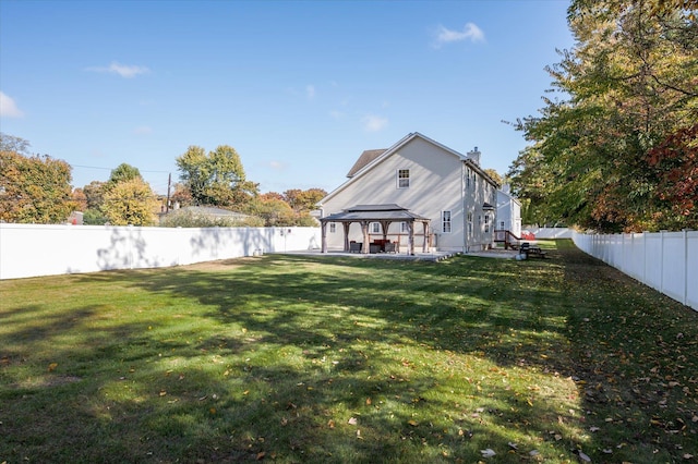 2 Undset Ct, Dix Hills, NY 11746 - back of house with a gazebo, a fenced backyard, a patio, and a chimney