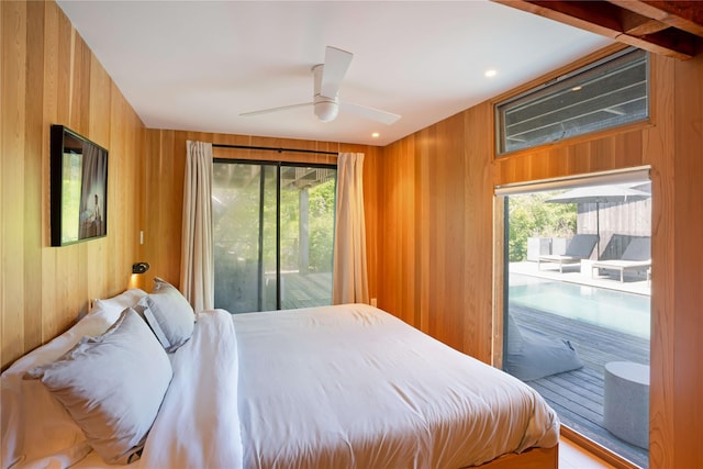 490 Tarpon Walk, Fire Island Pines, NY 11782 - bedroom with access to outside, wooden walls, and ceiling fan