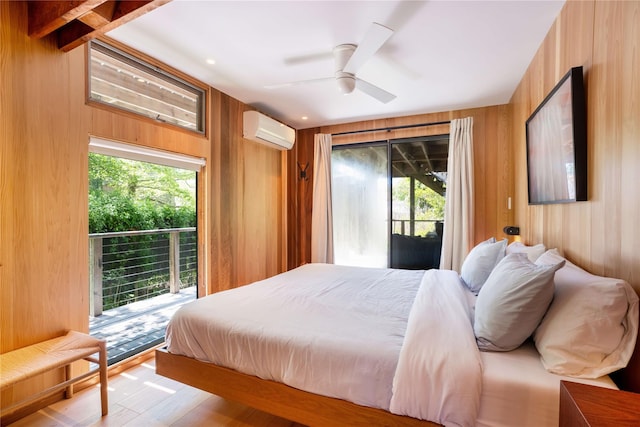 490 Tarpon Walk, Fire Island Pines, NY 11782 - bedroom with a wall unit AC, access to outside, multiple windows, and wooden walls