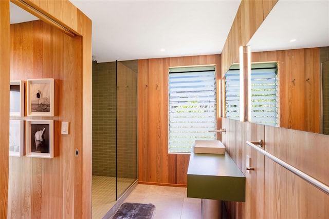 490 Tarpon Walk, Fire Island Pines, NY 11782 - full bathroom with a tile shower, wood walls, and tile patterned flooring