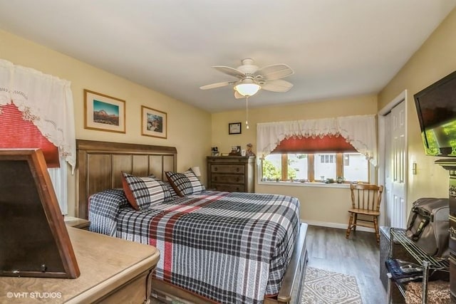 2976 Ruth Rd, Wantagh, NY 11793 - bedroom featuring wood finished floors, a ceiling fan, and baseboards