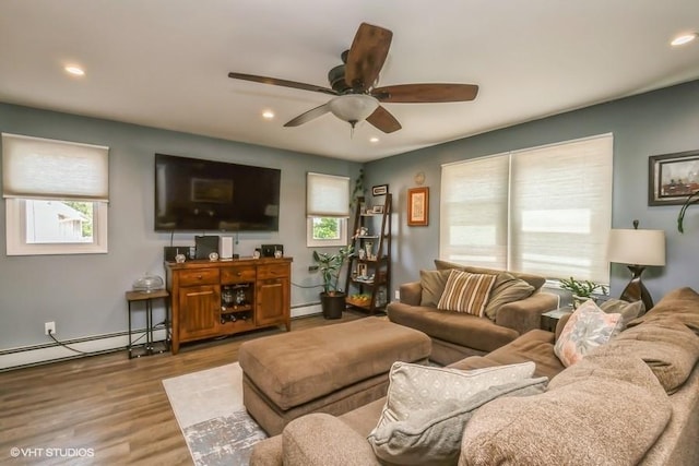 2976 Ruth Rd, Wantagh, NY 11793 - living area with plenty of natural light, a baseboard radiator, recessed lighting, and ceiling fan