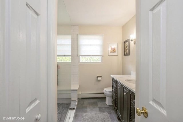 2976 Ruth Rd, Wantagh, NY 11793 - full bathroom with a baseboard radiator, vanity, a tile shower, and toilet
