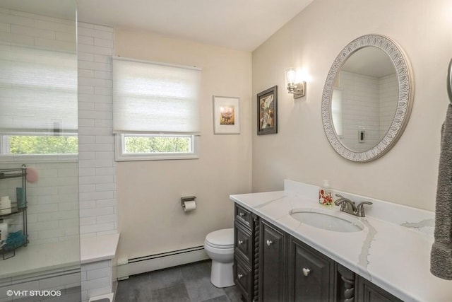 2976 Ruth Rd, Wantagh, NY 11793 - full bathroom featuring a baseboard heating unit, vanity, toilet, and walk in shower