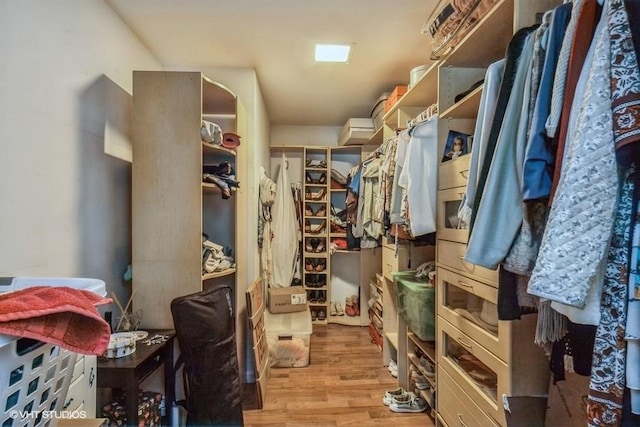 2976 Ruth Rd, Wantagh, NY 11793 - walk in closet featuring wood finished floors