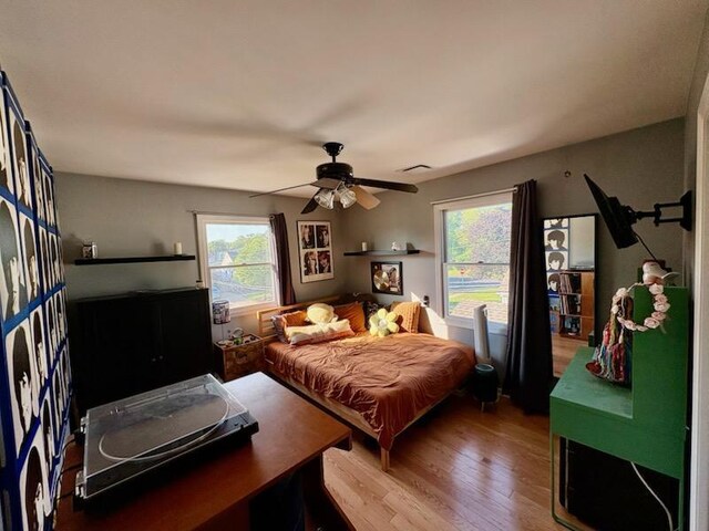 2976 Ruth Rd, Wantagh, NY 11793 - bedroom with wood finished floors and ceiling fan