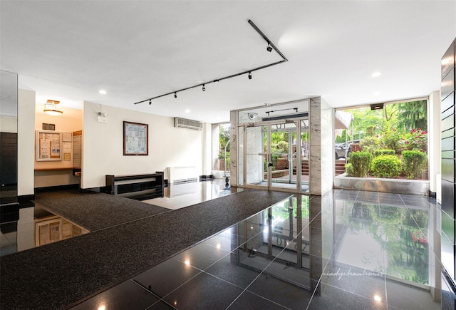 72-10 112th St Unit 5B, Forest Hills, NY 11375 - building lobby with floor to ceiling windows and recessed lighting
