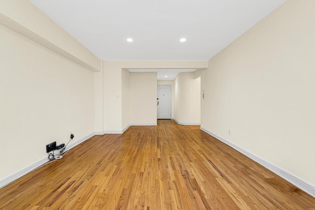 72-10 112th St Unit 5B, Forest Hills, NY 11375 - empty room featuring light wood-style flooring, baseboards, and recessed lighting