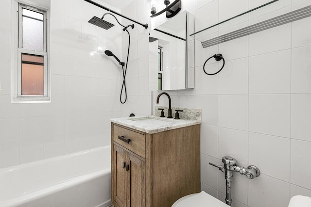 72-10 112th St Unit 5B, Forest Hills, NY 11375 - full bath with toilet, vanity, bathing tub / shower combination, and tile walls
