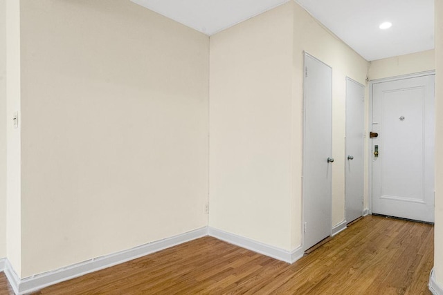 72-10 112th St Unit 5B, Forest Hills, NY 11375 - hall with light wood-type flooring, baseboards, and recessed lighting