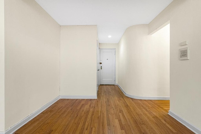 72-10 112th St Unit 5B, Forest Hills, NY 11375 - spare room with baseboards, wood finished floors, and recessed lighting