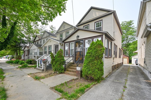 43-24 219th St, Bayside, NY 11361 - view of front of property with an outbuilding