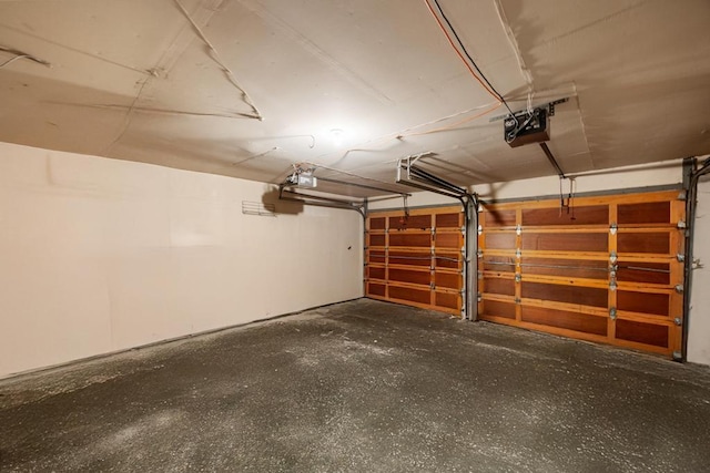 797 Caldwell Ave, North Woodmere, NY 11581 - garage featuring a garage door opener