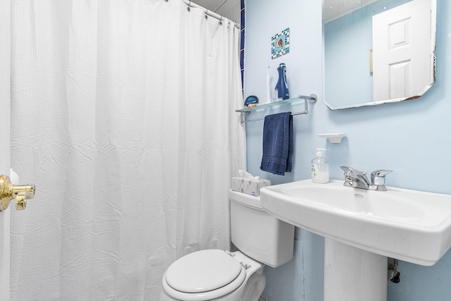 45 W 23rd St, Deer Park, NY 11729 - full bathroom featuring toilet, curtained shower, and a sink