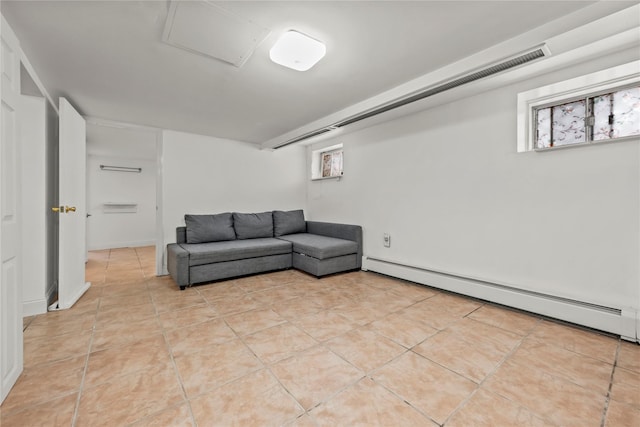 21-38 73rd St, Astoria, NY 11370 - unfurnished living room featuring baseboard heating and light tile patterned floors