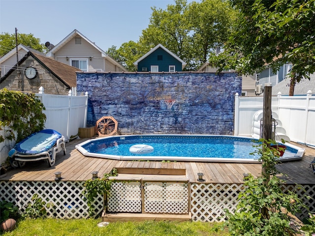 21-38 73rd St, Astoria, NY 11370 - view of pool featuring a wooden deck
