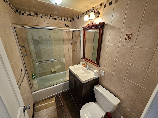 6422 Bay Pkwy Unit 3A, Brooklyn, NY 11204 - bathroom with tile walls, shower / bath combination with glass door, vanity, and tile patterned flooring