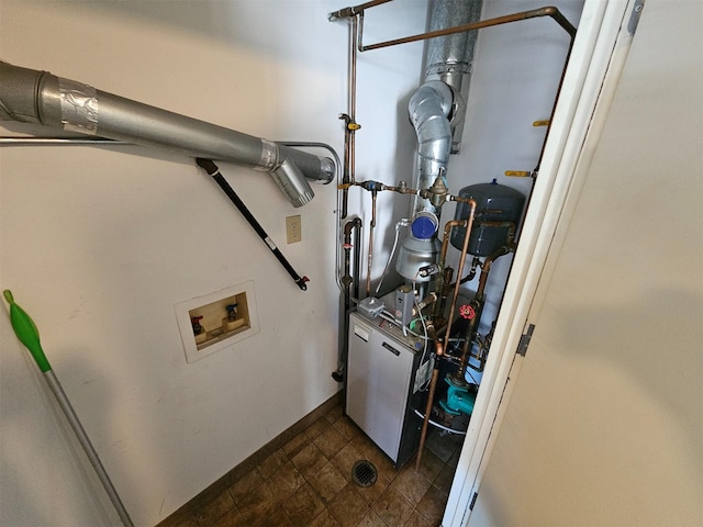 6422 Bay Pkwy Unit 3A, Brooklyn, NY 11204 - laundry room featuring washer hookup and baseboards