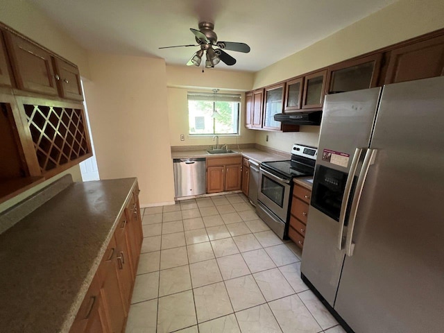 13 Timber Rdg, Mount Kisco, NY 10549 - kitchen featuring appliances with stainless steel finishes, under cabinet range hood, a sink, a ceiling fan, and glass insert cabinets