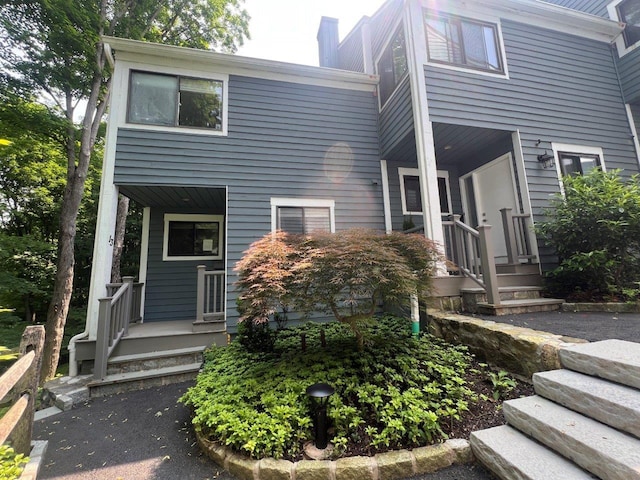 13 Timber Rdg, Mount Kisco, NY 10549 - view of front of house with a porch