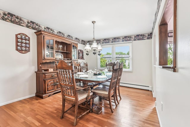 304 Cloverdale Ct, New Windsor, NY 12553 - dining space featuring baseboard heating, a chandelier, and light wood-type flooring