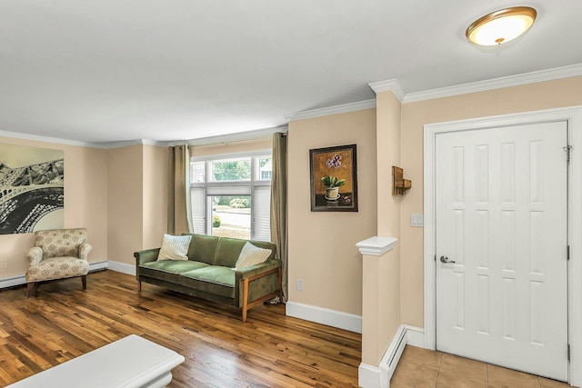 14 Troy Ct, Northport, NY 11768 - foyer with baseboards, light wood-type flooring, crown molding, and baseboard heating