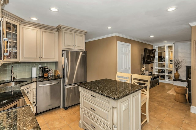 14 Troy Ct, Northport, NY 11768 - kitchen with appliances with stainless steel finishes, a sink, recessed lighting, crown molding, and cream cabinets