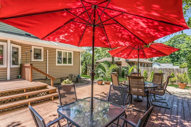 14 Troy Ct, Northport, NY 11768 - wooden deck featuring outdoor dining space and a fenced backyard