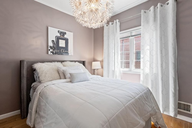 20407 29th Ave, Bayside, NY 11360 - bedroom featuring a chandelier, baseboards, crown molding, and wood finished floors