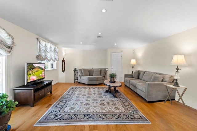 20407 29th Ave, Bayside, NY 11360 - living room with light wood finished floors and recessed lighting
