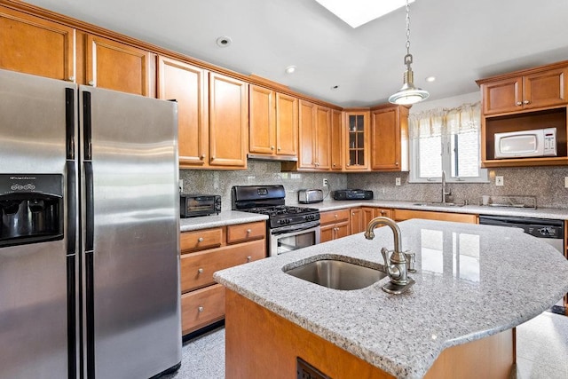 20407 29th Ave, Bayside, NY 11360 - kitchen featuring stainless steel appliances, a sink, under cabinet range hood, a center island with sink, and recessed lighting