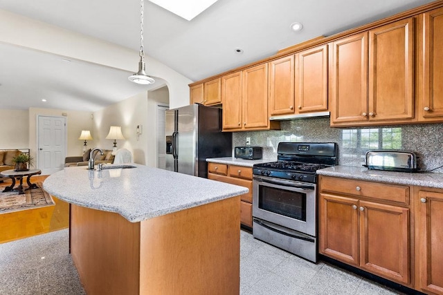 20407 29th Ave, Bayside, NY 11360 - kitchen with stainless steel appliances, a sink, under cabinet range hood, decorative backsplash, and a center island with sink