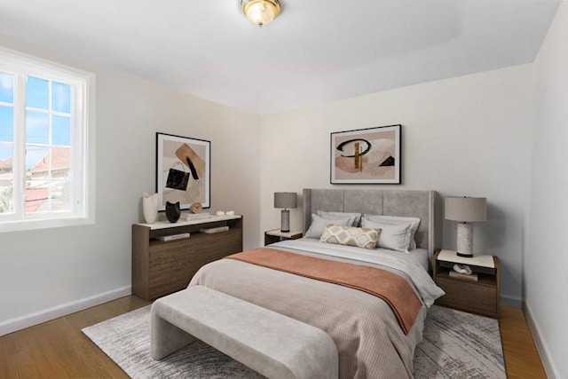 20407 29th Ave, Bayside, NY 11360 - bedroom featuring baseboards and wood finished floors