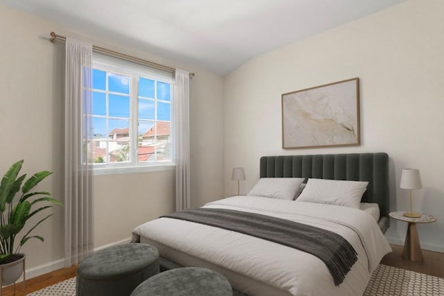 20407 29th Ave, Bayside, NY 11360 - bedroom featuring baseboards, wood finished floors, and vaulted ceiling
