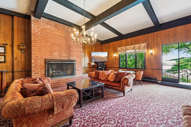 16 Rockledge Unit 3L-1, Ossining, NY 10562 - living area featuring wood walls, beamed ceiling, carpet floors, a fireplace, and a chandelier