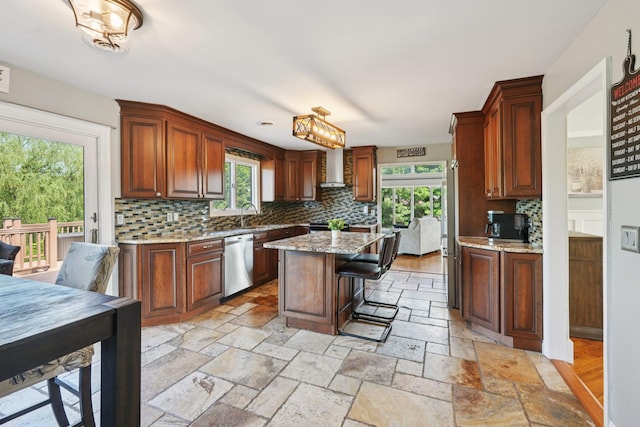 30 Sunrise Rdg, Florida, NY 10921 - kitchen featuring appliances with stainless steel finishes, backsplash, healthy amount of natural light, and a center island