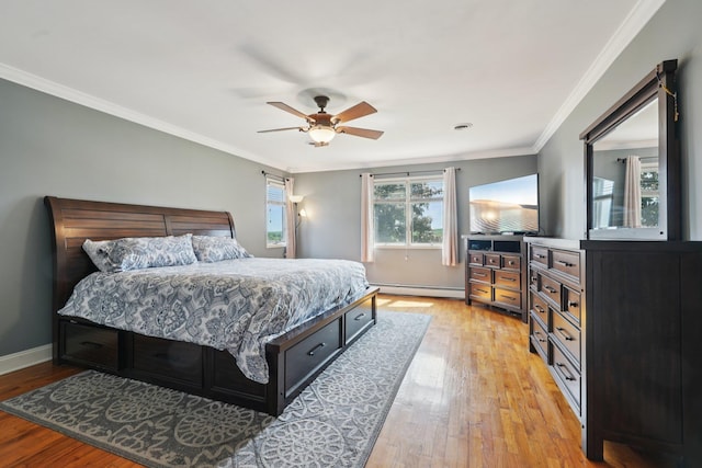 30 Sunrise Rdg, Florida, NY 10921 - bedroom with baseboard heating, light wood-style flooring, baseboards, crown molding, and ceiling fan