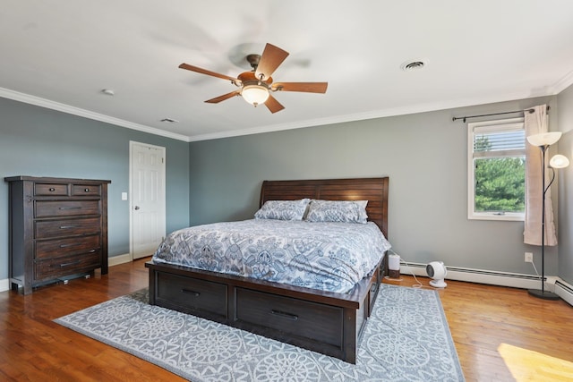 30 Sunrise Rdg, Florida, NY 10921 - bedroom with crown molding, wood finished floors, baseboards, ceiling fan, and a baseboard heating unit