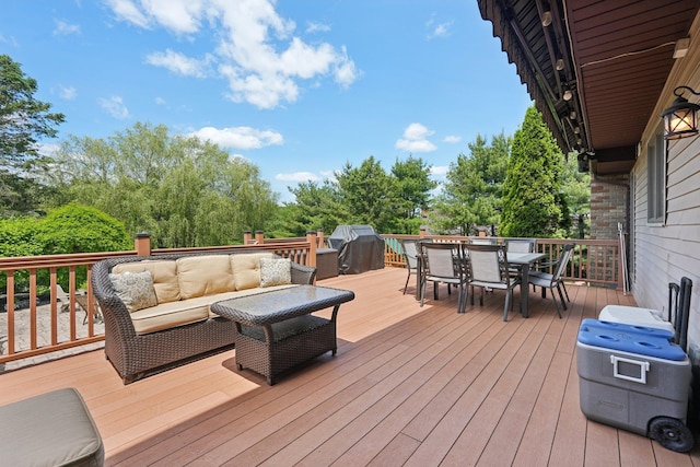 30 Sunrise Rdg, Florida, NY 10921 - wooden deck with outdoor dining area, outdoor lounge area, view of wooded area, and a grill
