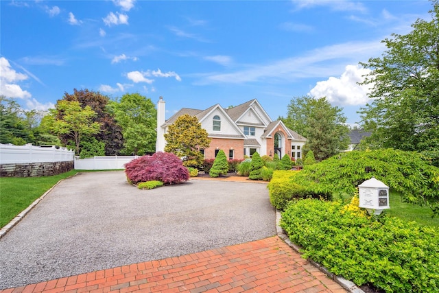 3 Sugar Maple Ct, Dix Hills, NY 11746 - view of front of property with a chimney and brick siding