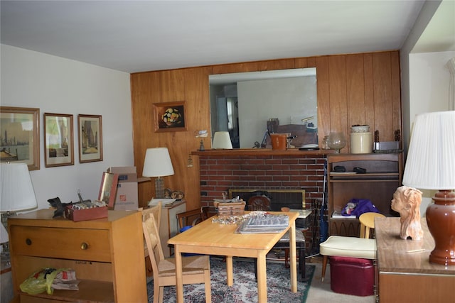 25 Alda Dr, Poughkeepsie, NY 12603 - dining space with wood walls and a fireplace