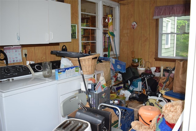 25 Alda Dr, Poughkeepsie, NY 12603 - laundry room with separate washer and dryer, wood walls, and cabinet space