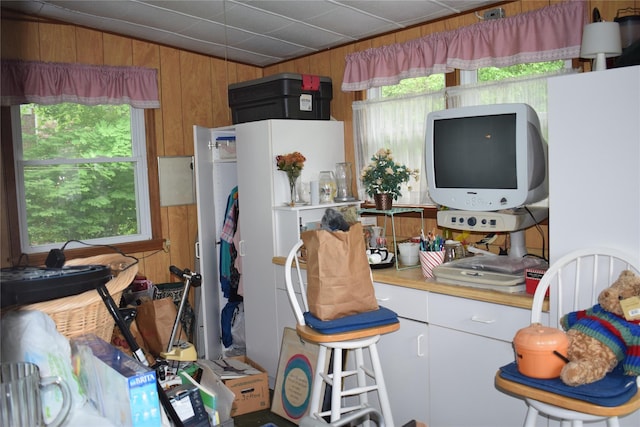 25 Alda Dr, Poughkeepsie, NY 12603 - kitchen with wood walls, plenty of natural light, and light countertops