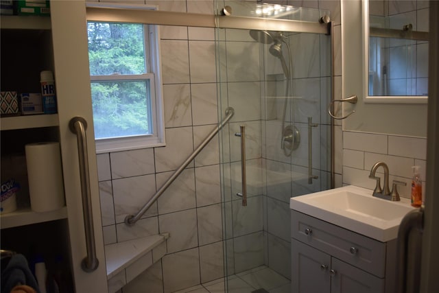25 Alda Dr, Poughkeepsie, NY 12603 - bathroom with tile walls, vanity, a stall shower, and plenty of natural light