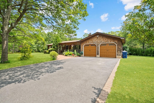 8 Jackson Ave, Hampton Bays, NY 11946 - ranch-style house with an attached garage, covered porch, a front lawn, and driveway