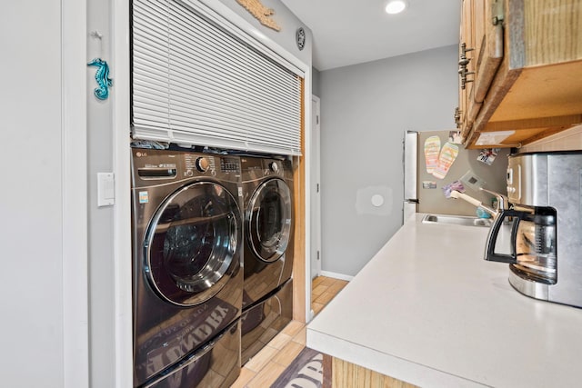 8 Jackson Ave, Hampton Bays, NY 11946 - laundry area featuring independent washer and dryer, a sink, and recessed lighting